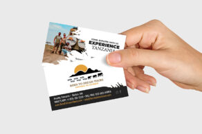 hand holding business card we designed for Safari company